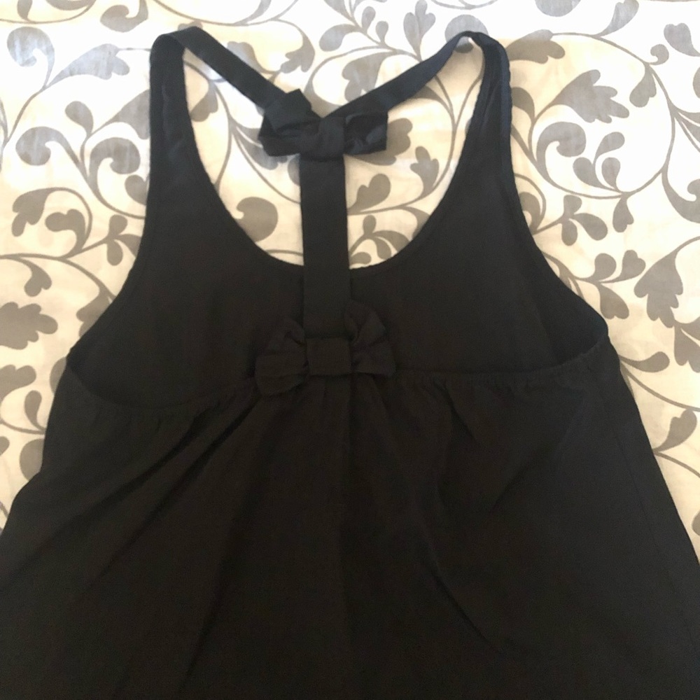 black “Love Culture” brand T-back tank top